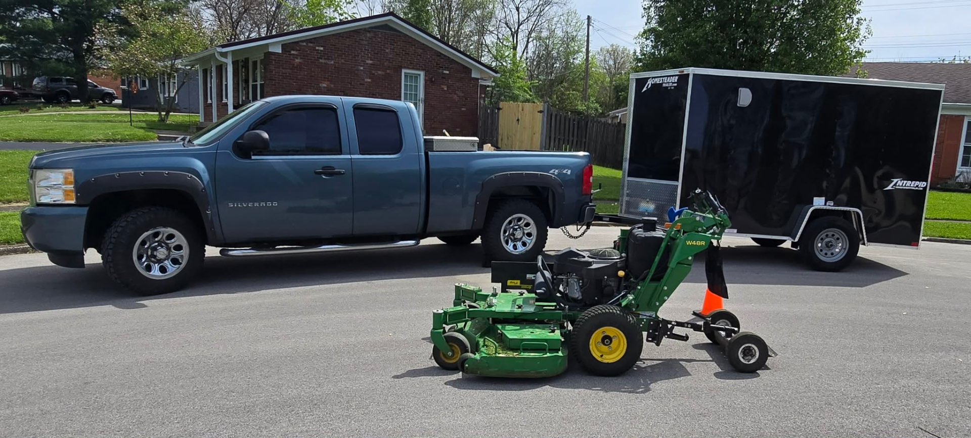 Truck and mower ready for route